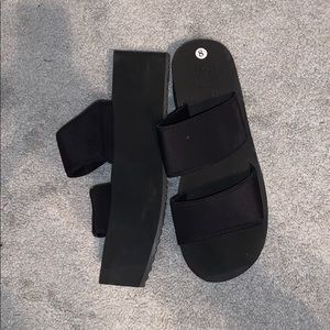 Black platform slides